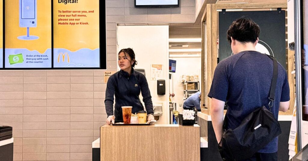On May 8, 2024, in San Francisco, California, a McDonald's employee gets ready to deliver an order.